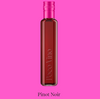 Bottle of Poco Vino Pinot Noir on a pink background